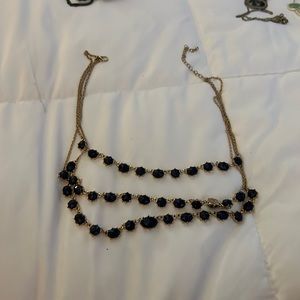 Triple strand navy stone necklace
